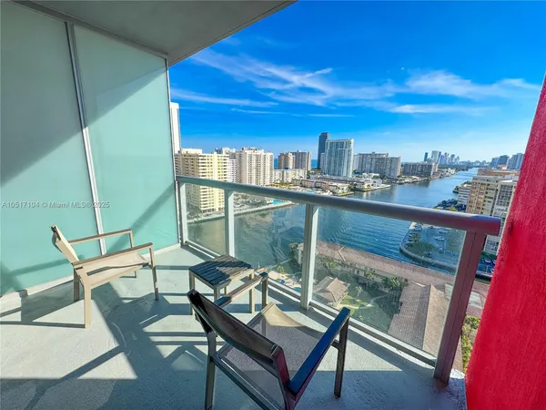 a view of balcony with furniture