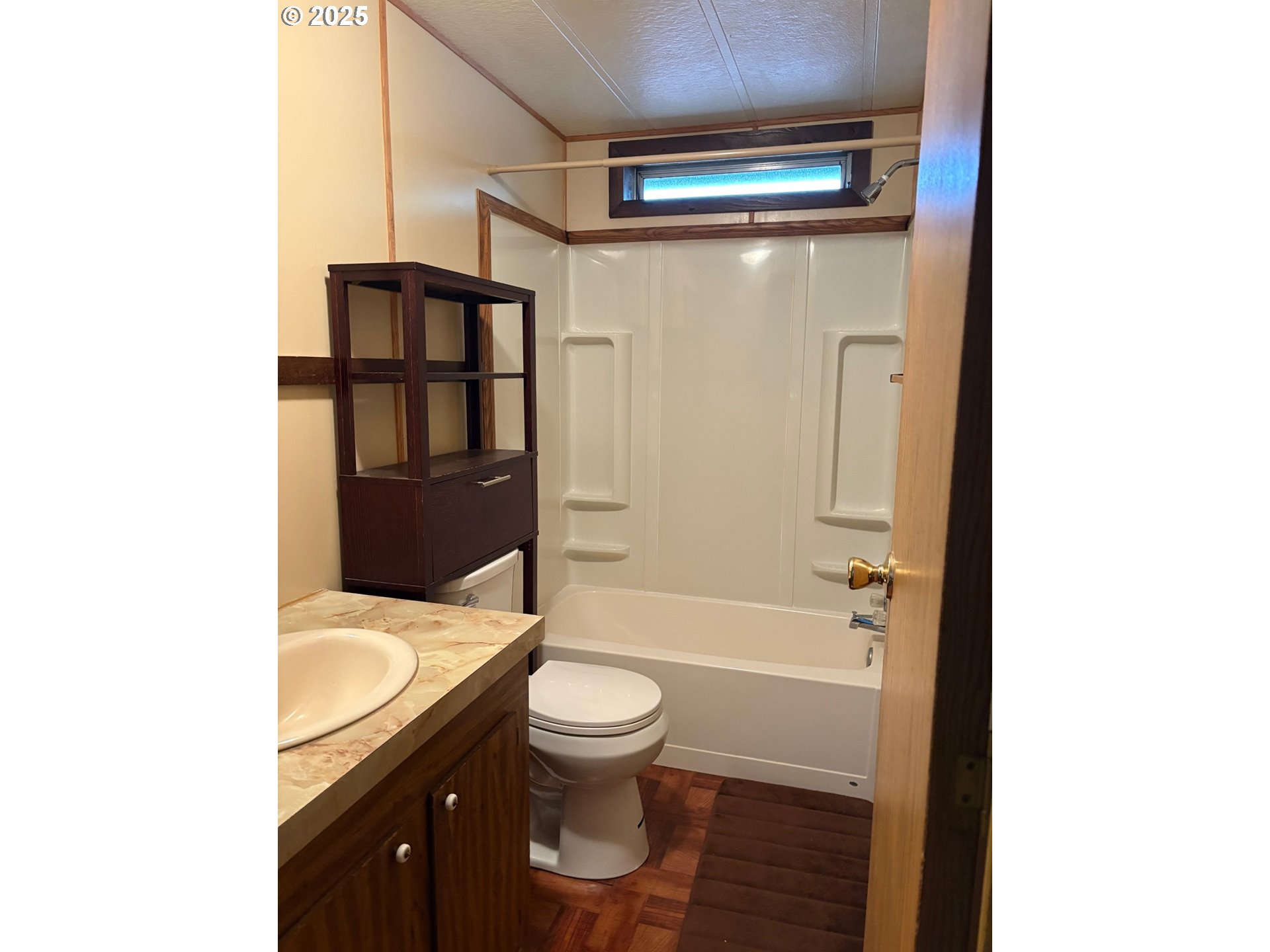 818 Celilo Road North Bonneville, WA 98639 - Photo 15 of 35 a bathroom with a granite countertop sink toilet and shower