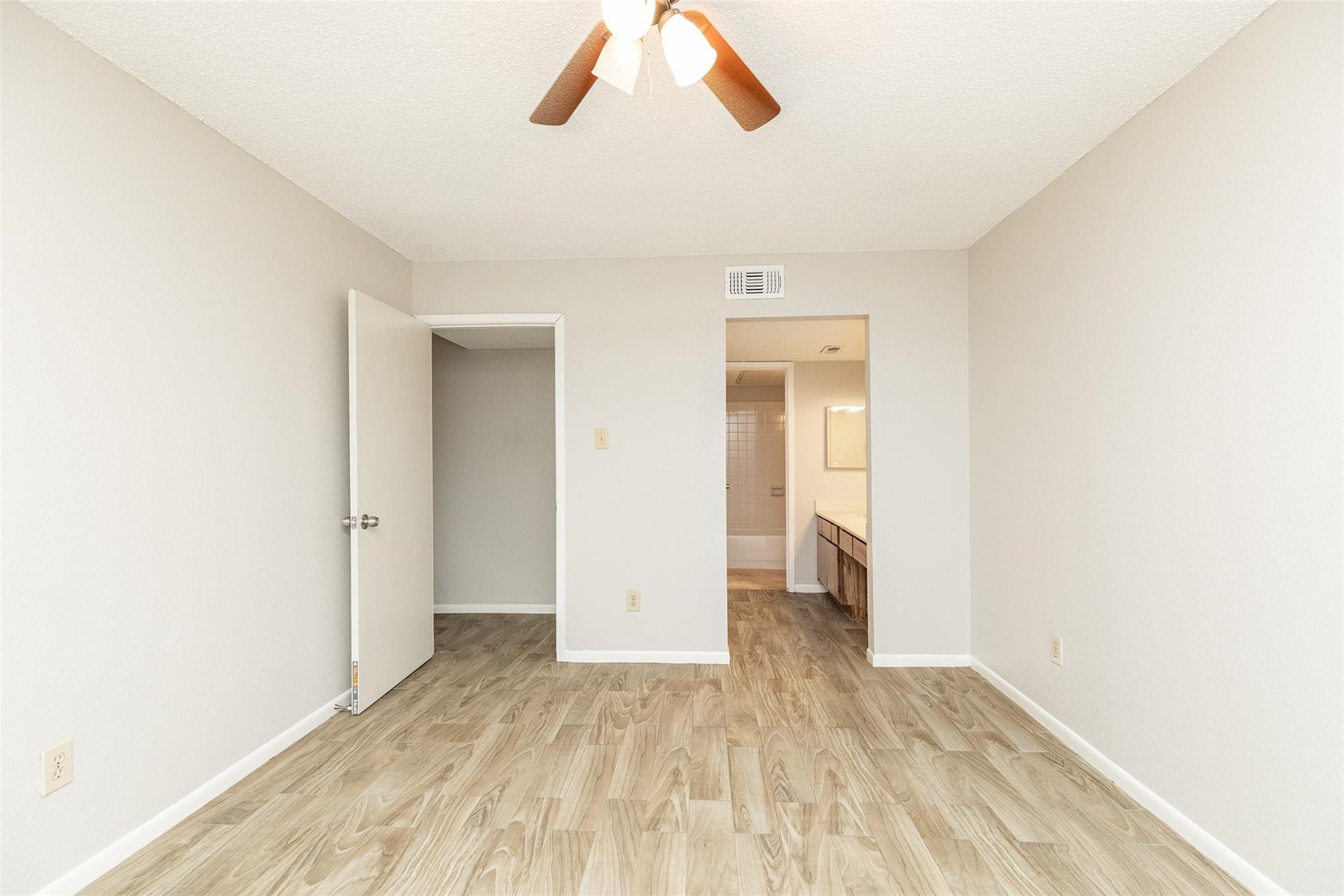 2800 Jeanetta Street, Unit 2805 Houston, TX 77063 - Photo 15 of 19 a view of empty room with wooden floor