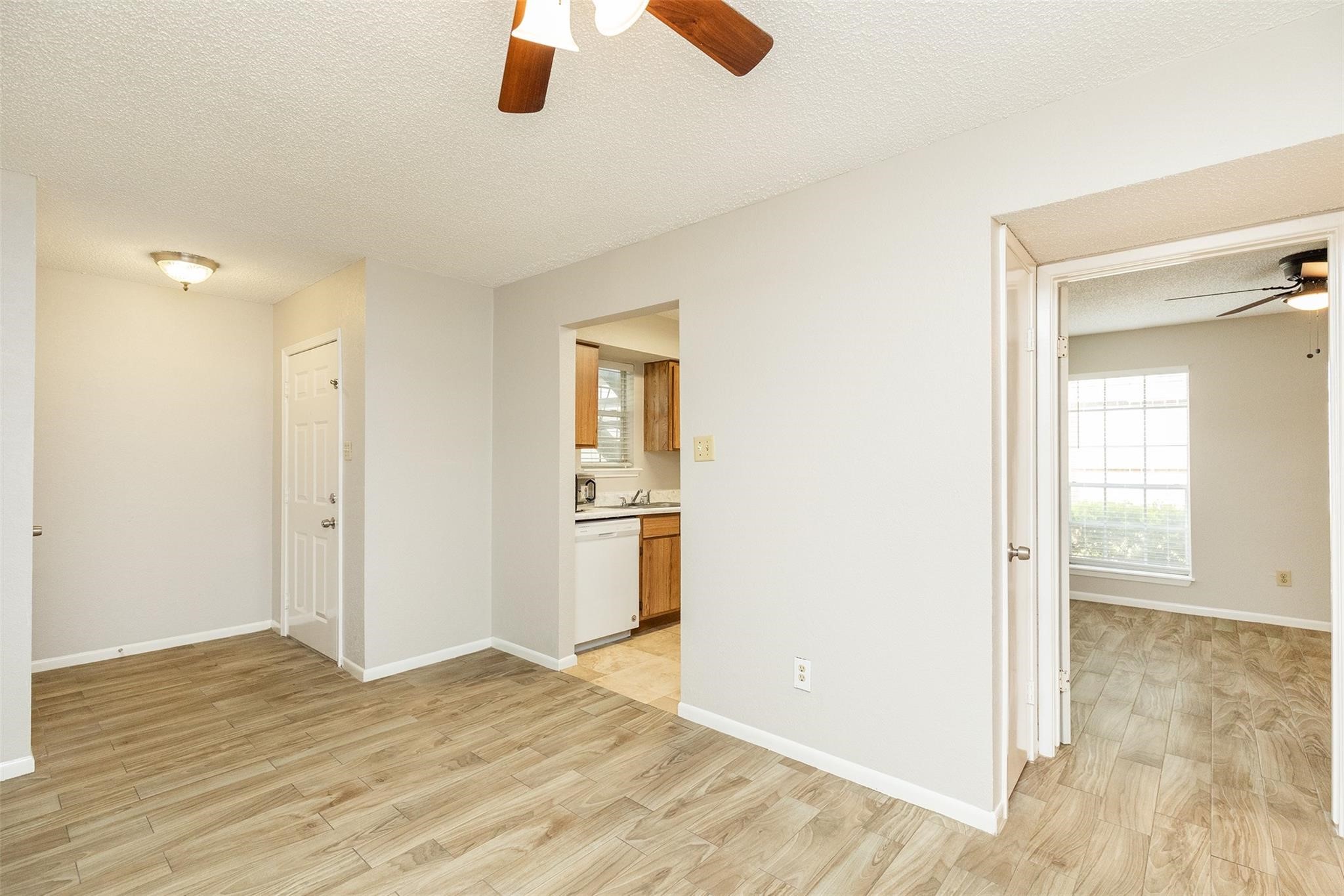 2800 Jeanetta Street, Unit 2805 Houston, TX 77063 - Photo 10 of 19 wooden floor in an empty room