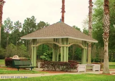 a white refrigerator freezer sitting inside of a kitchen