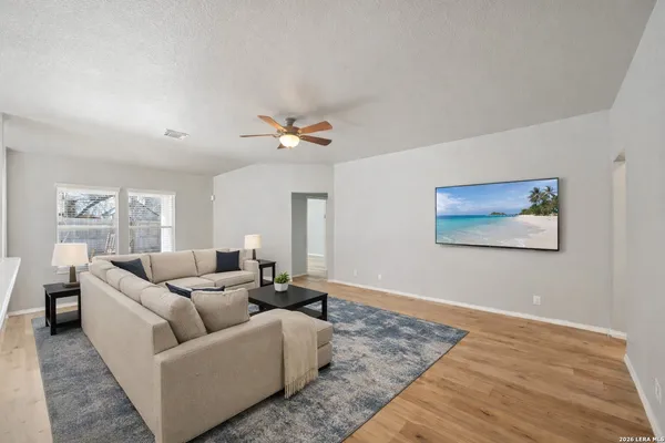 a view of a kitchen with a sink and a stove