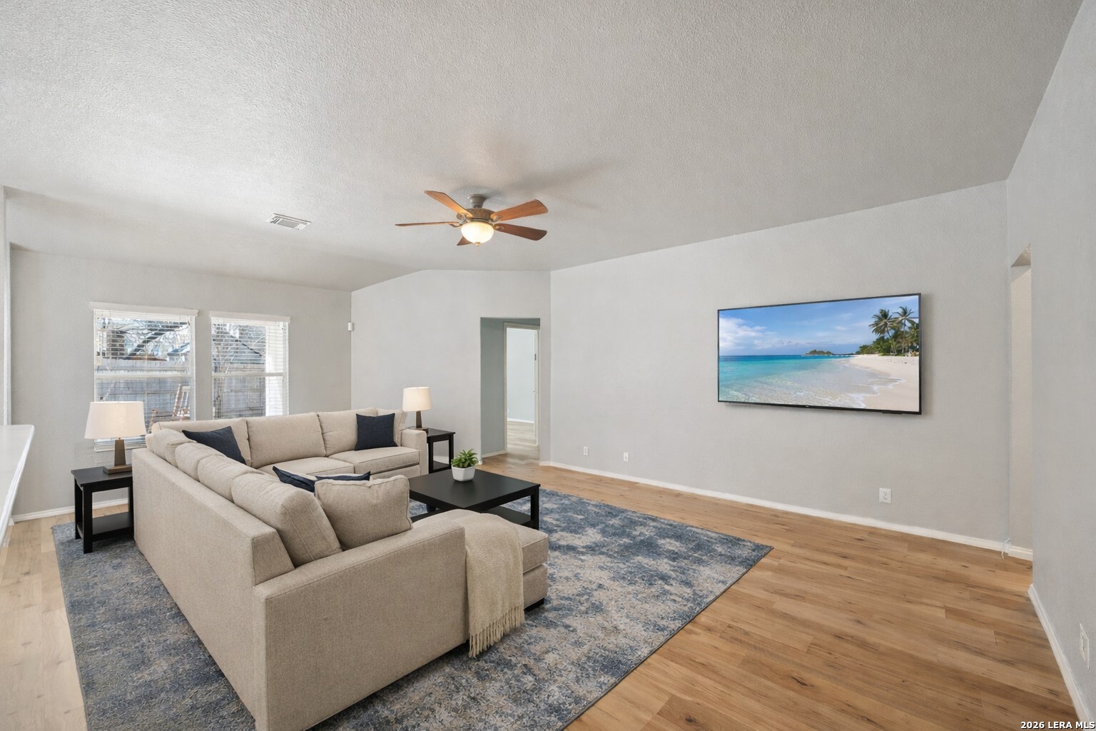 626 Rexton Lane San Antonio, TX 78258 - Photo 13 of 34 a living room with furniture and a large window