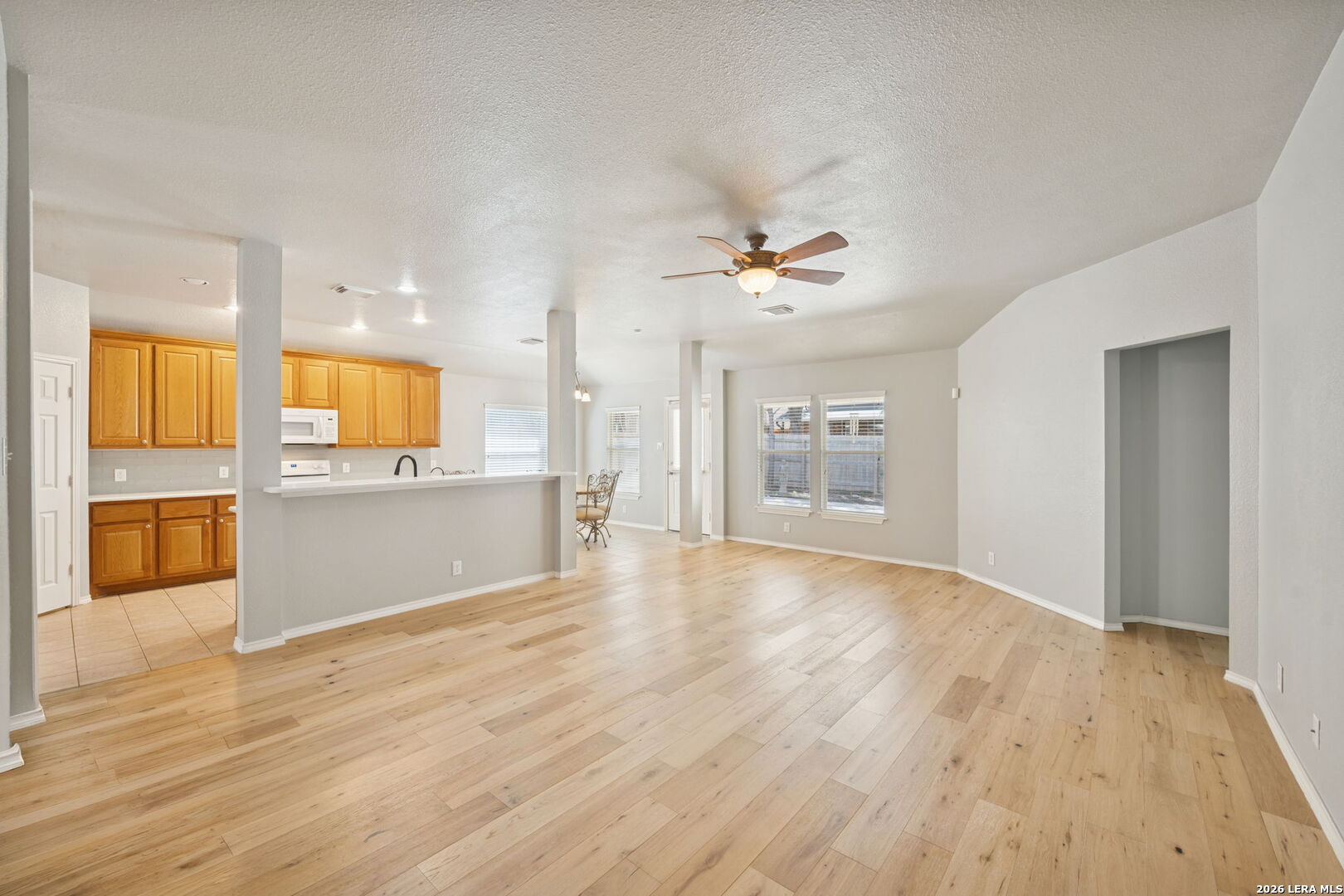 626 Rexton Lane San Antonio, TX 78258 - Photo 14 of 34 a view of a kitchen with a sink and a stove