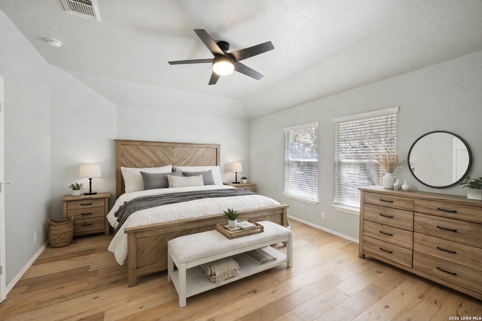 626 Rexton Lane San Antonio, TX 78258 - Photo 22 of 34 a bedroom with a bed and with furniture