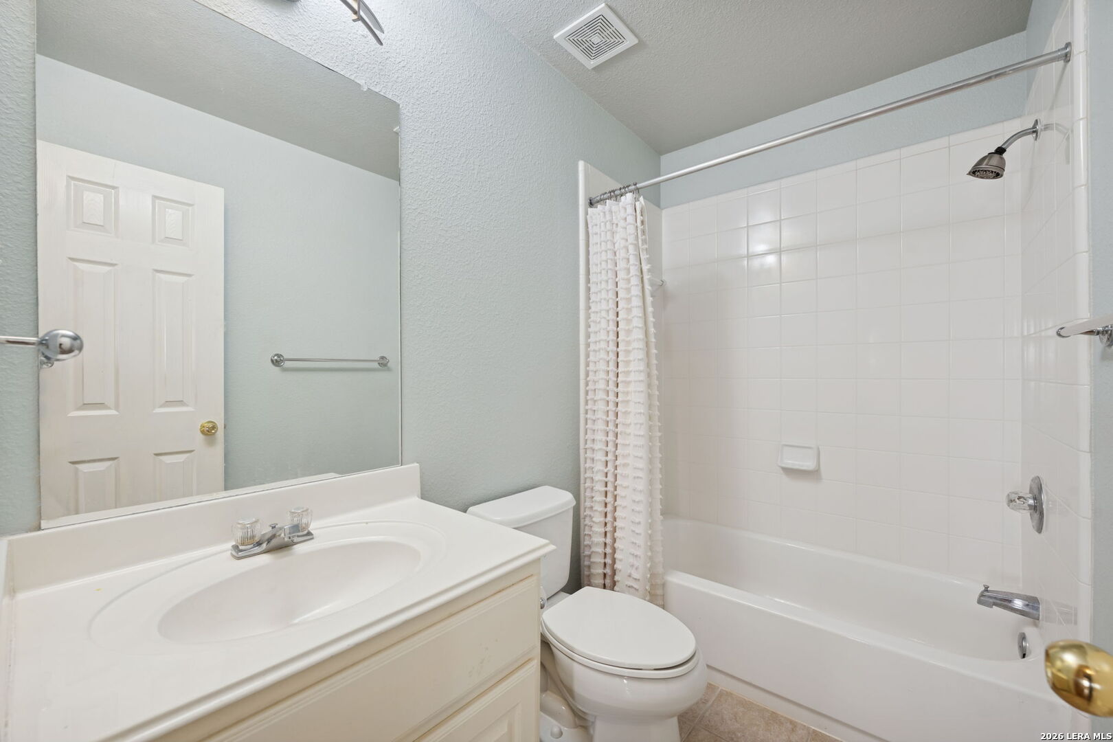 626 Rexton Lane San Antonio, TX 78258 - Photo 29 of 34 a bathroom with a sink toilet and shower