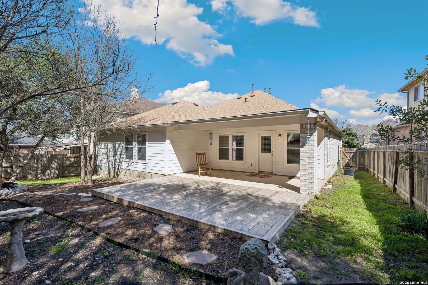 626 Rexton Lane San Antonio, TX 78258 - Photo 33 of 34 a front view of a house with a garden