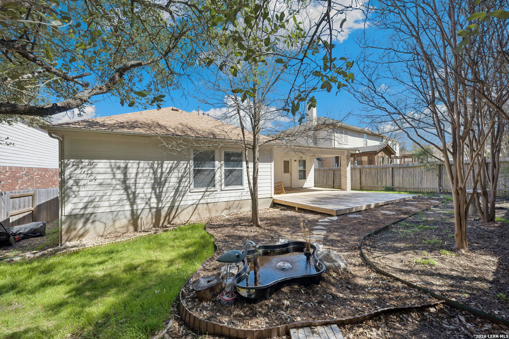 626 Rexton Lane San Antonio, TX 78258 - Photo 34 of 34 a view of a house with backyard and sitting area