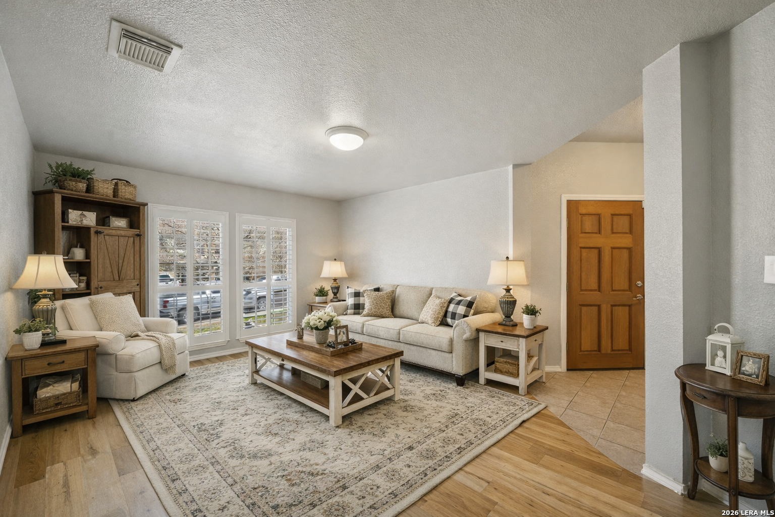626 Rexton Lane San Antonio, TX 78258 - Photo 8 of 34 a living room with furniture and a couch