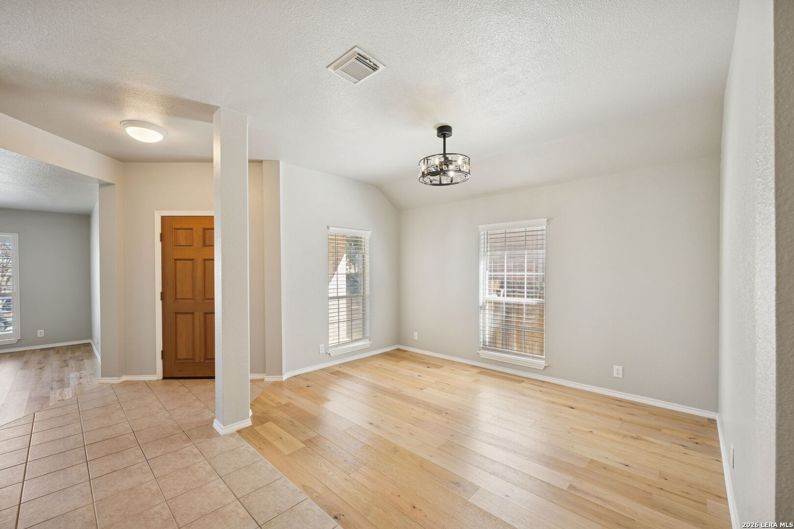 626 Rexton Lane San Antonio, TX 78258 - Photo 9 of 34 a view of an empty room with closet and windows