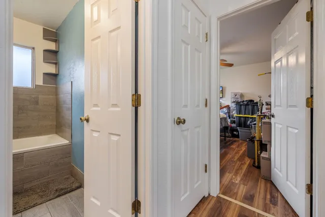 a view of a livingroom and a bathroom