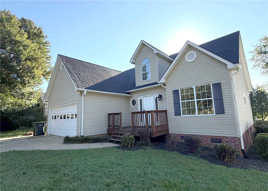 116 Kelly Lane Easley, SC 29642 - Photo 1 of 39 Gabled rooflines and classic siding define this charming multi-level residence with an attached garage.