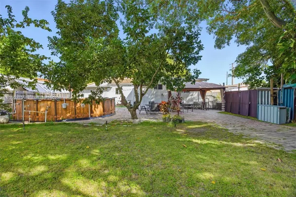 front view of a house with a small yard