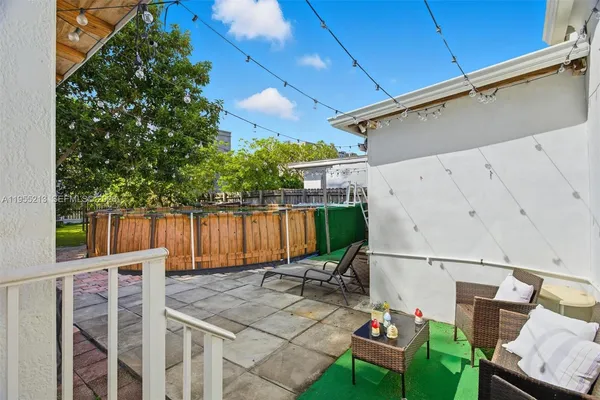 a view of backyard of a house