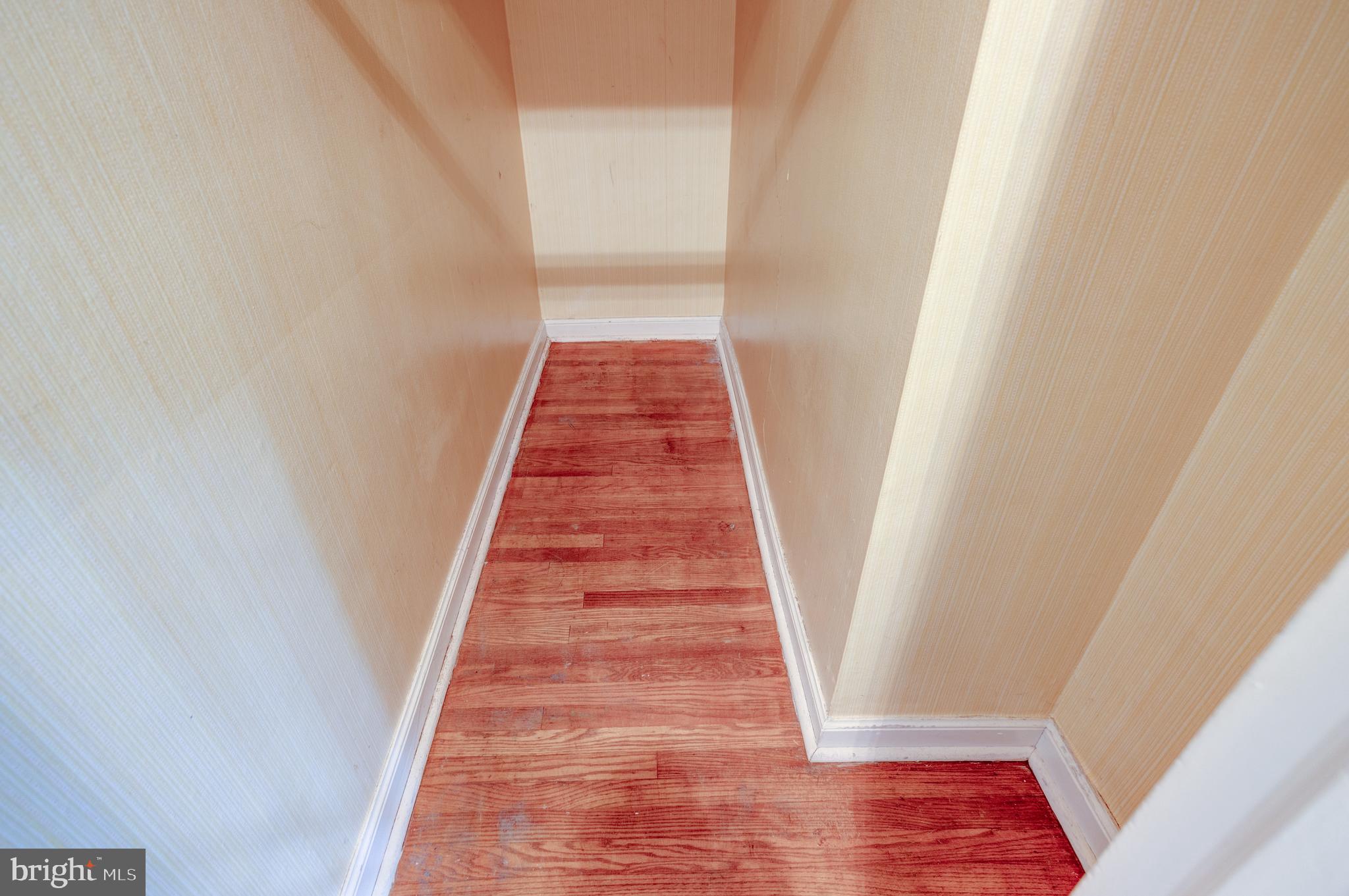 1307 Church Road Oreland, PA 19075 - Photo 17 of 28 Hallway closet with hardwood flooring