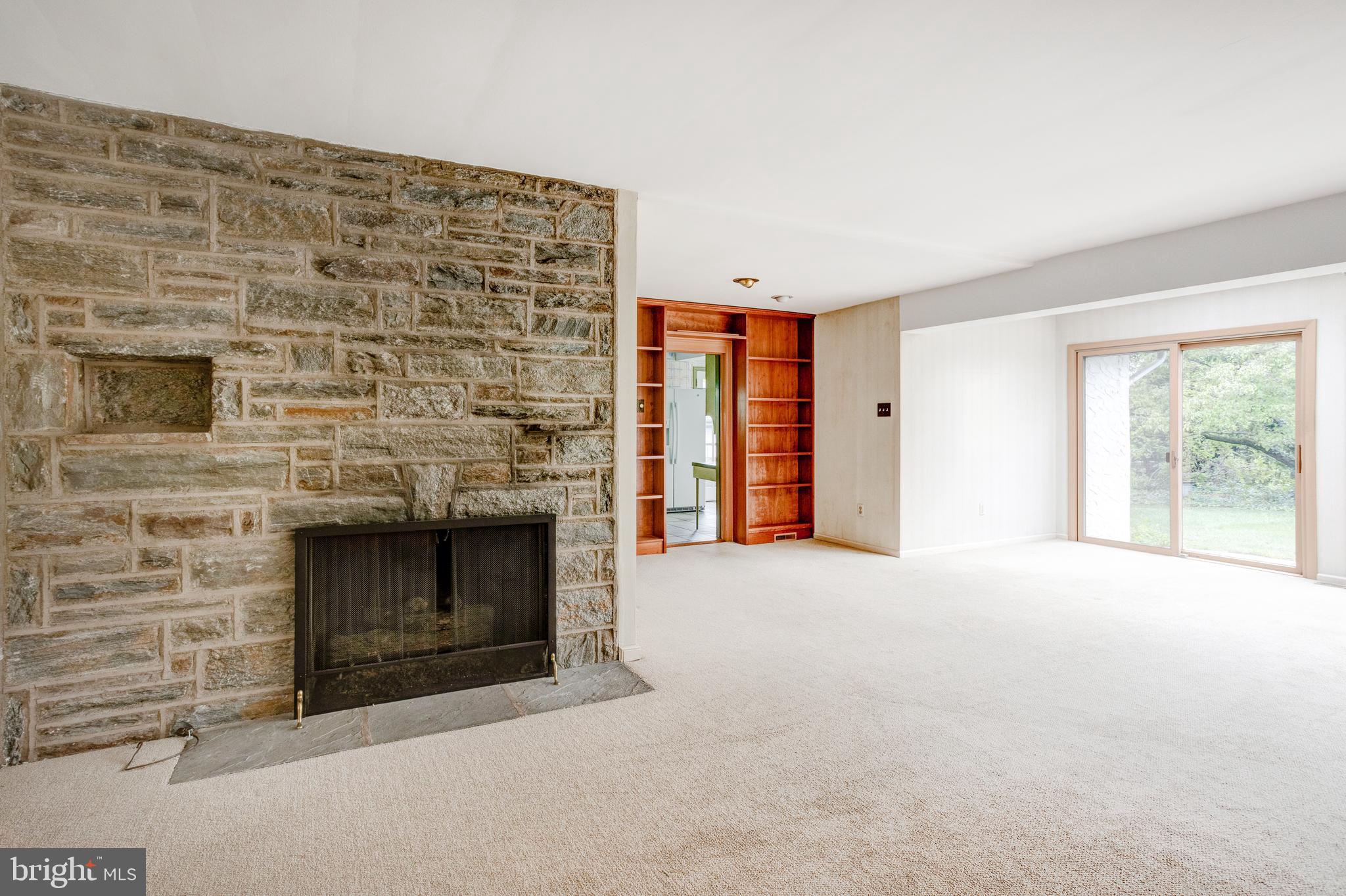 1307 Church Road Oreland, PA 19075 - Photo 5 of 28 Living room with fireplace and built-ins