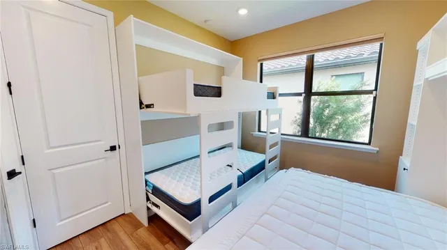 a room with a bed and a window