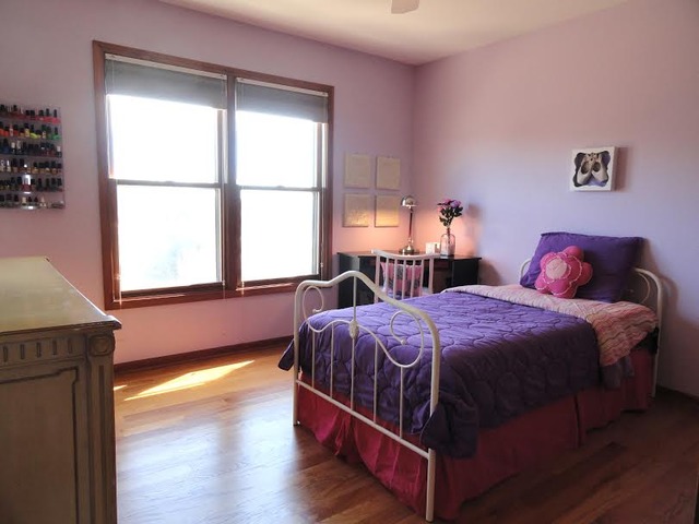 496 Lewis Road Geneva, IL 60134 - Photo 12 of 18 a bedroom with a bed and window