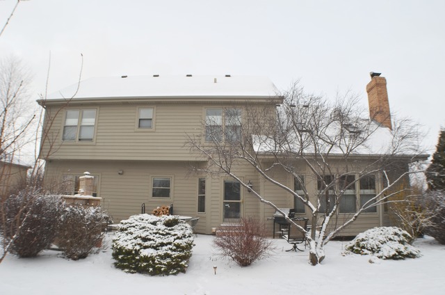 496 Lewis Road Geneva, IL 60134 - Photo 18 of 18 a front view of a house with a yard