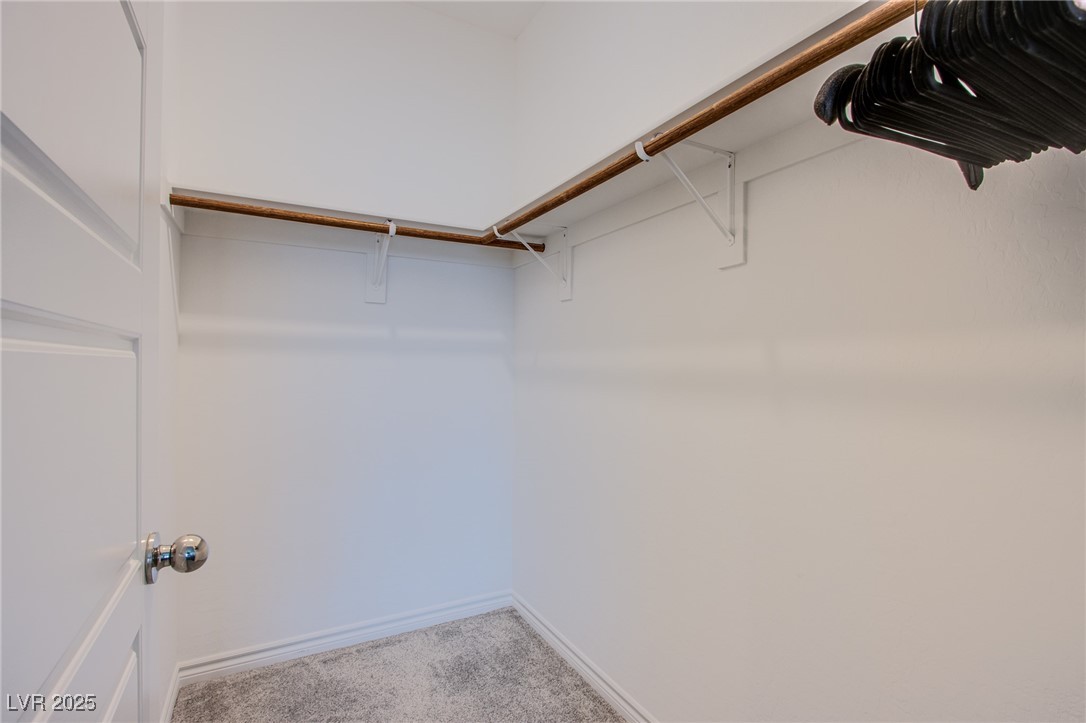 7336 North Decatur Boulevard, Unit 1 North Las Vegas, NV 89084 - Photo 16 of 39 Large Walk In Closet in the Primary Bedroom