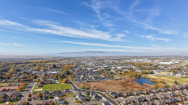 368 East 700 North Springville, UT 84663 - Photo 34 of 55 Aerial perspective of suburban area featuring mountains