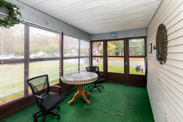 a room with furniture and a window