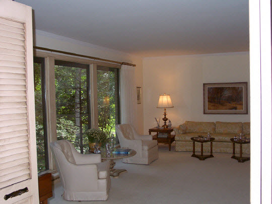 3915 Landstrom Road Rockford, IL 61107 - Photo 3 of 6 a living room with furniture and a large window