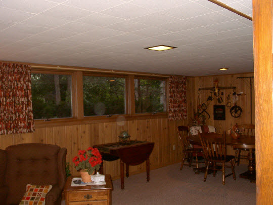 3915 Landstrom Road Rockford, IL 61107 - Photo 6 of 6 a living room with furniture and a large window