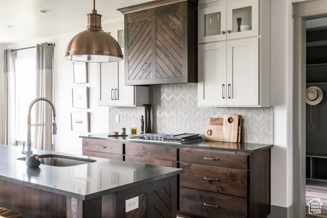 1547 North 1350 E Street, Unit 2 Mapleton, UT 84664 - Photo 10 of 18 Kitchen featuring stainless steel gas stovetop, decorative backsplash, extractor fan, and hanging light fixtures