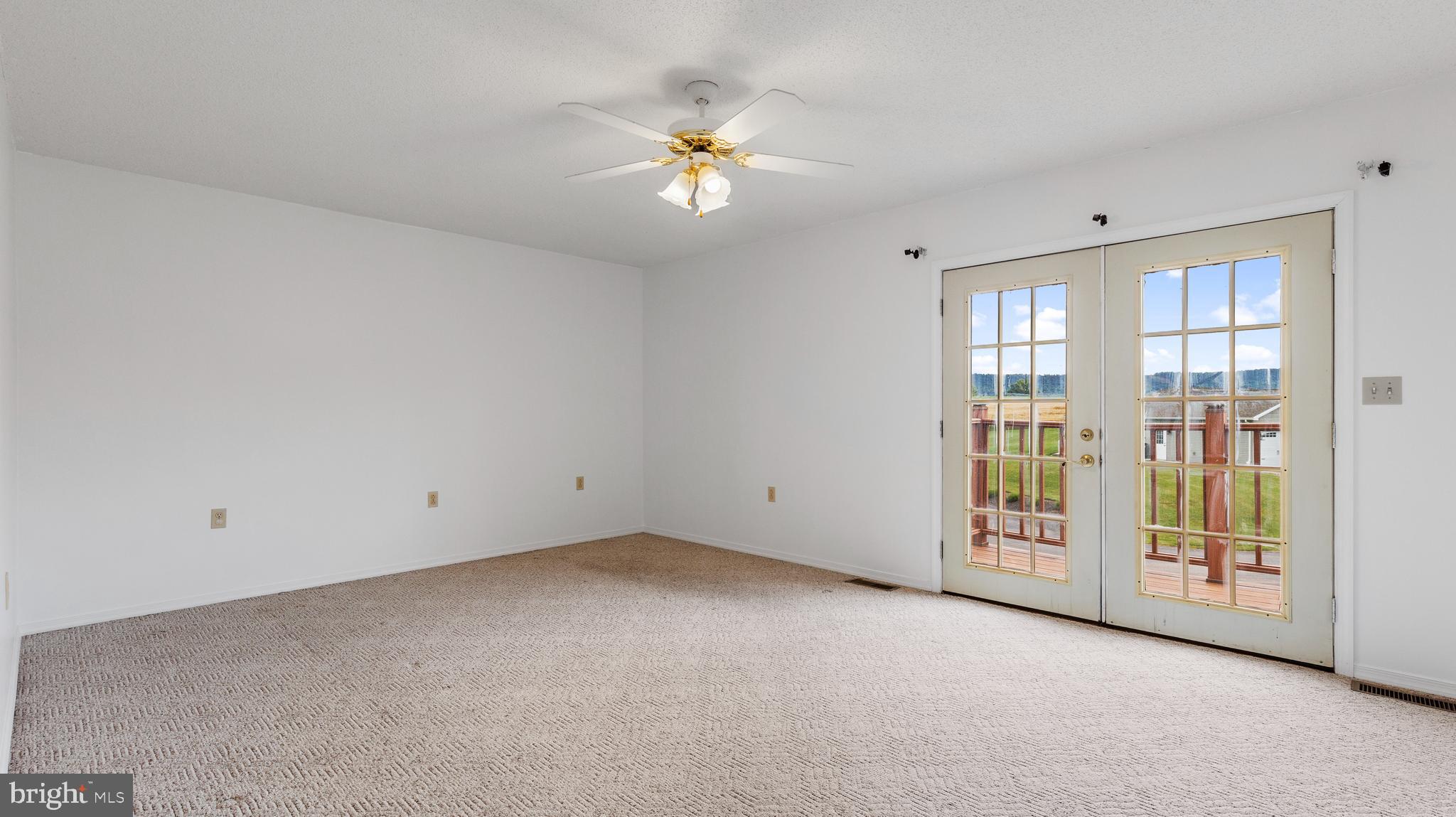 25 Powells Valley Road Halifax, PA 17032 - Photo 15 of 21 a view of an empty room with chandelier fan