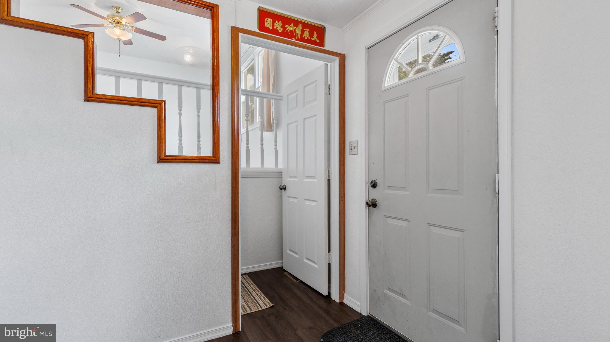 25 Powells Valley Road Halifax, PA 17032 - Photo 3 of 21 a view of a hallway with wooden floor and a bathroom