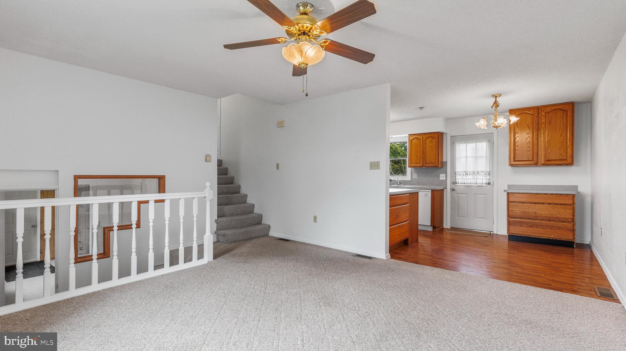 25 Powells Valley Road Halifax, PA 17032 - Photo 5 of 21 a view of a livingroom with furniture and a ceiling fan