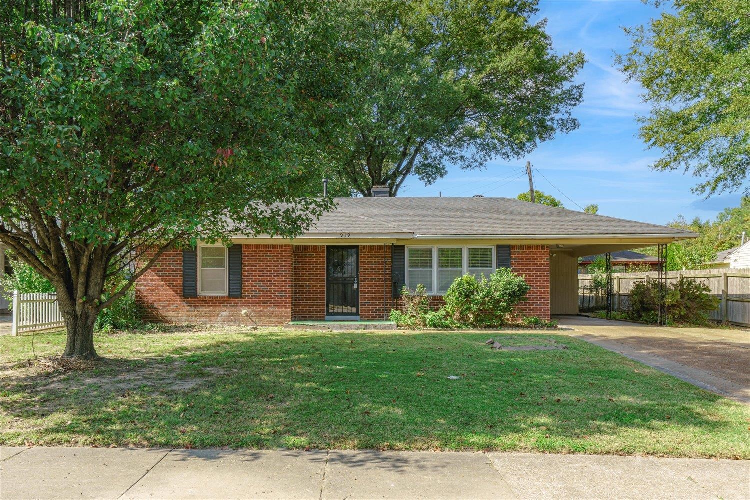 919 Stratford Road Memphis, TN 38122 - Photo 1 of 30 Ranch-style home featuring a front yard and a carport