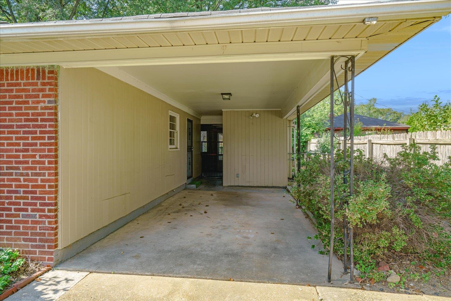 919 Stratford Road Memphis, TN 38122 - Photo 26 of 30 View of patio with a carport