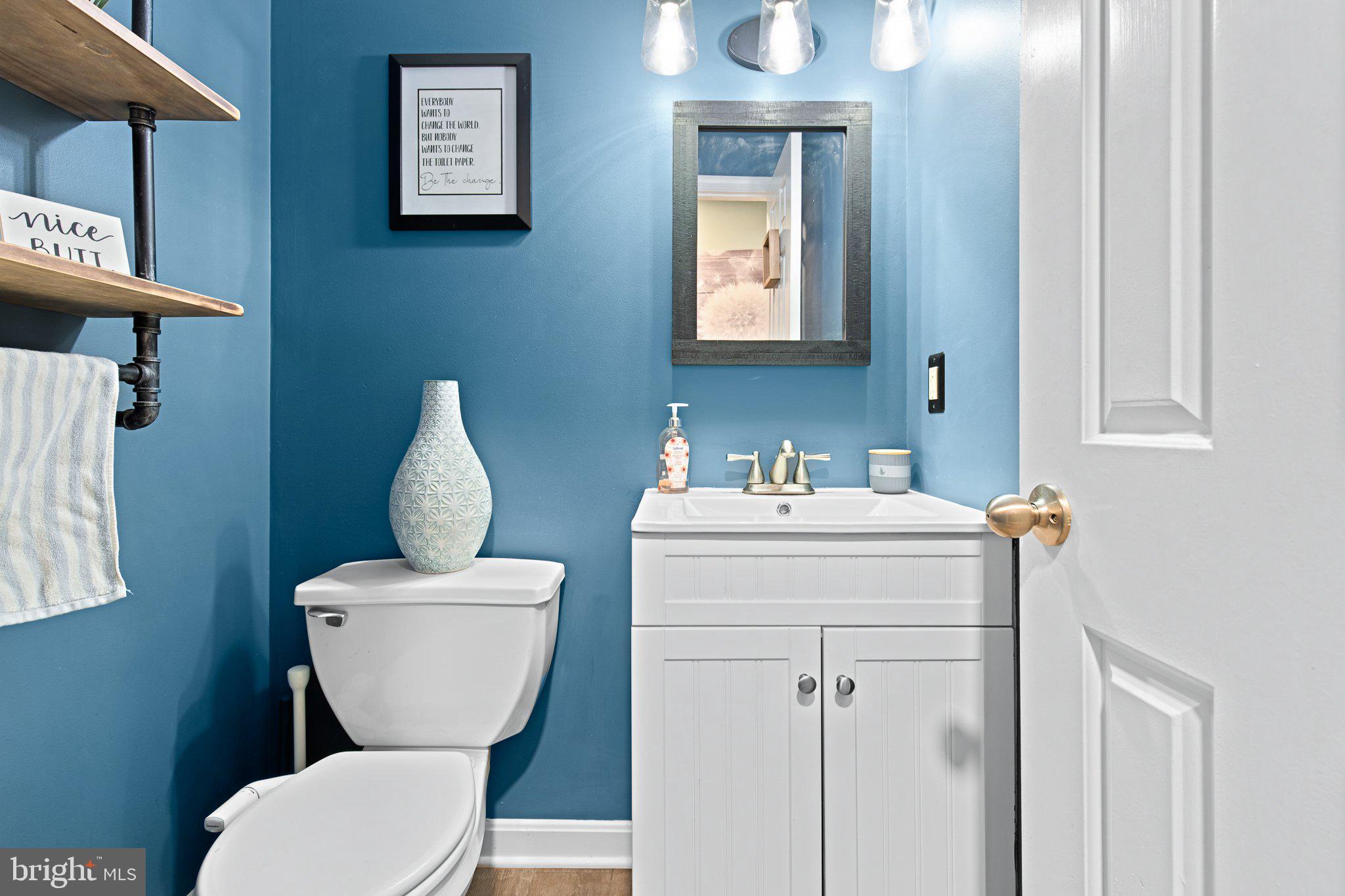 1024 Shadowstone Drive Lancaster, PA 17603 - Photo 11 of 28 a bathroom with a toilet sink and mirror