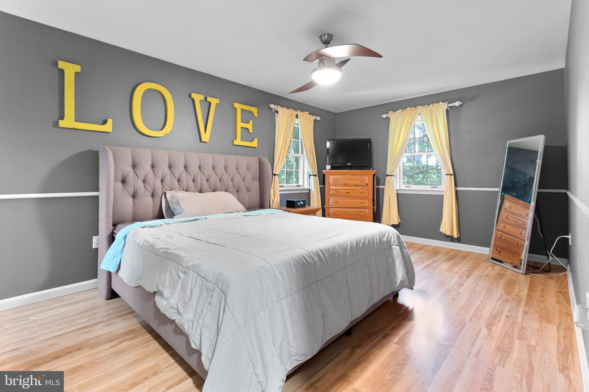 1024 Shadowstone Drive Lancaster, PA 17603 - Photo 13 of 28 a bedroom with a large bed and a window