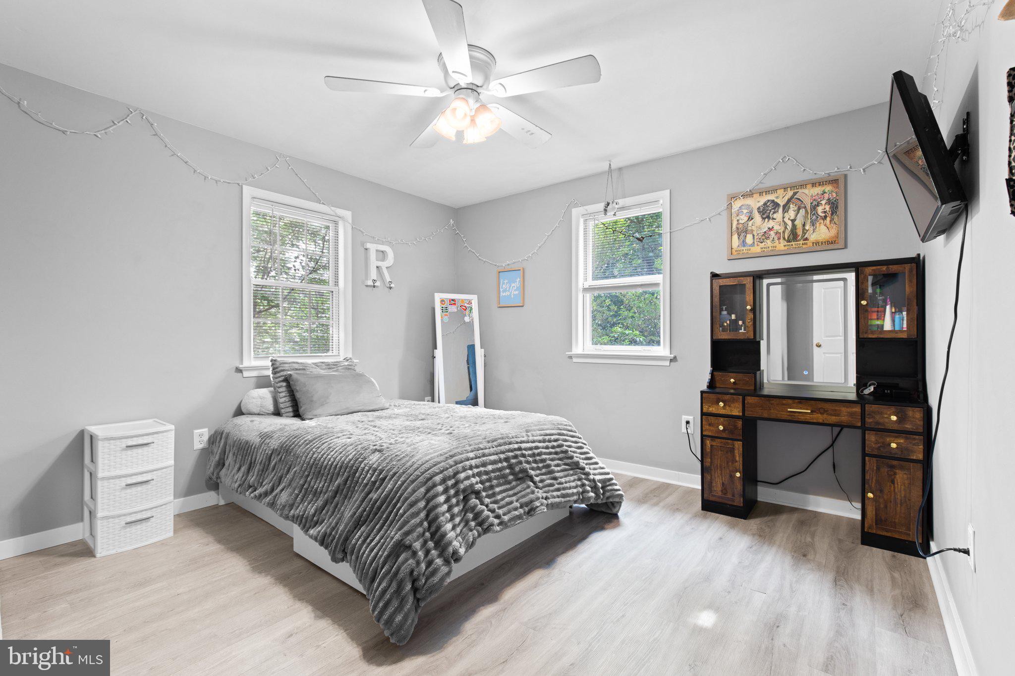1024 Shadowstone Drive Lancaster, PA 17603 - Photo 15 of 28 a bedroom with a bed and a table in it with window