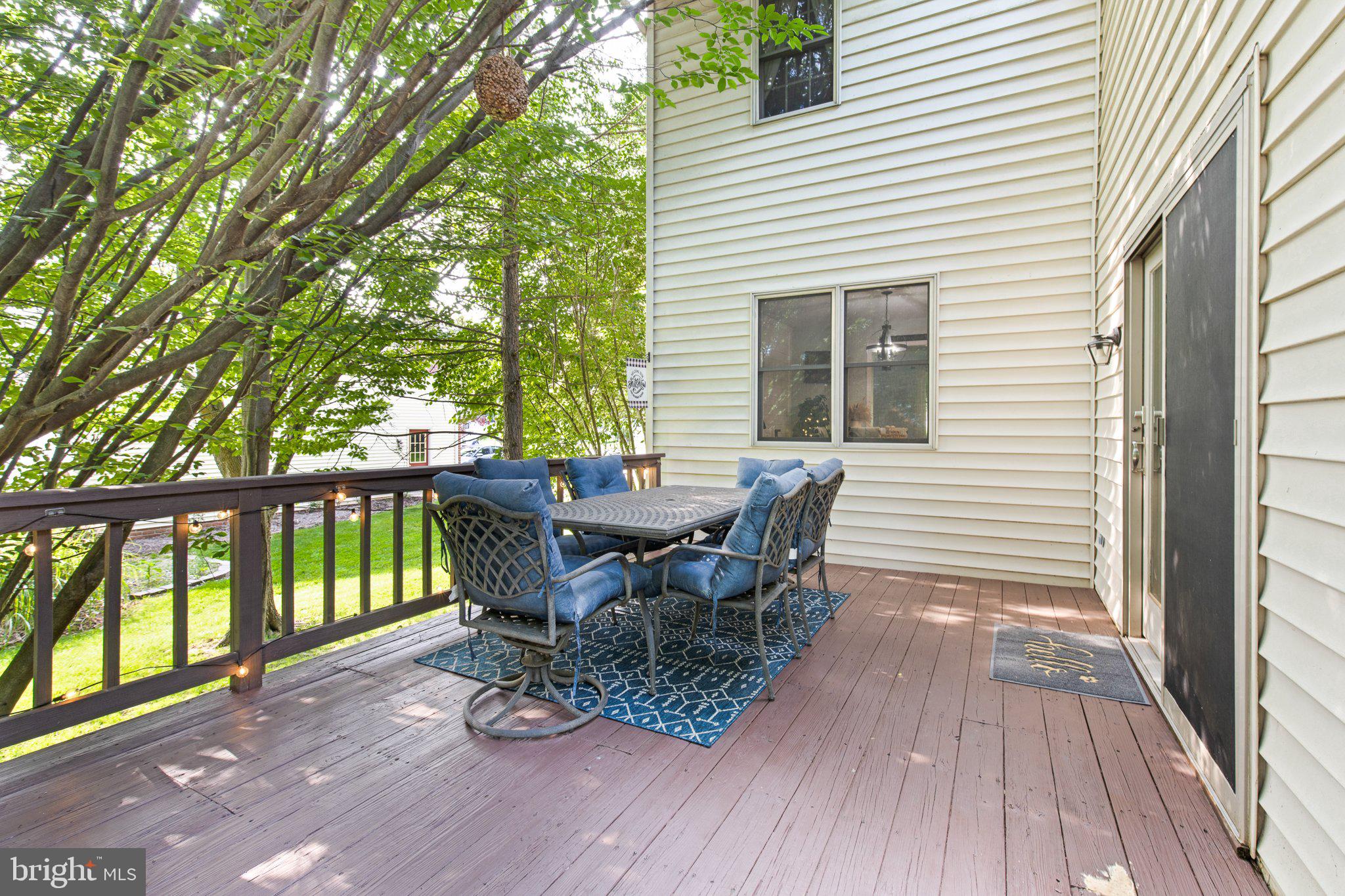 1024 Shadowstone Drive Lancaster, PA 17603 - Photo 20 of 28 a view of a patio with a table and chairs