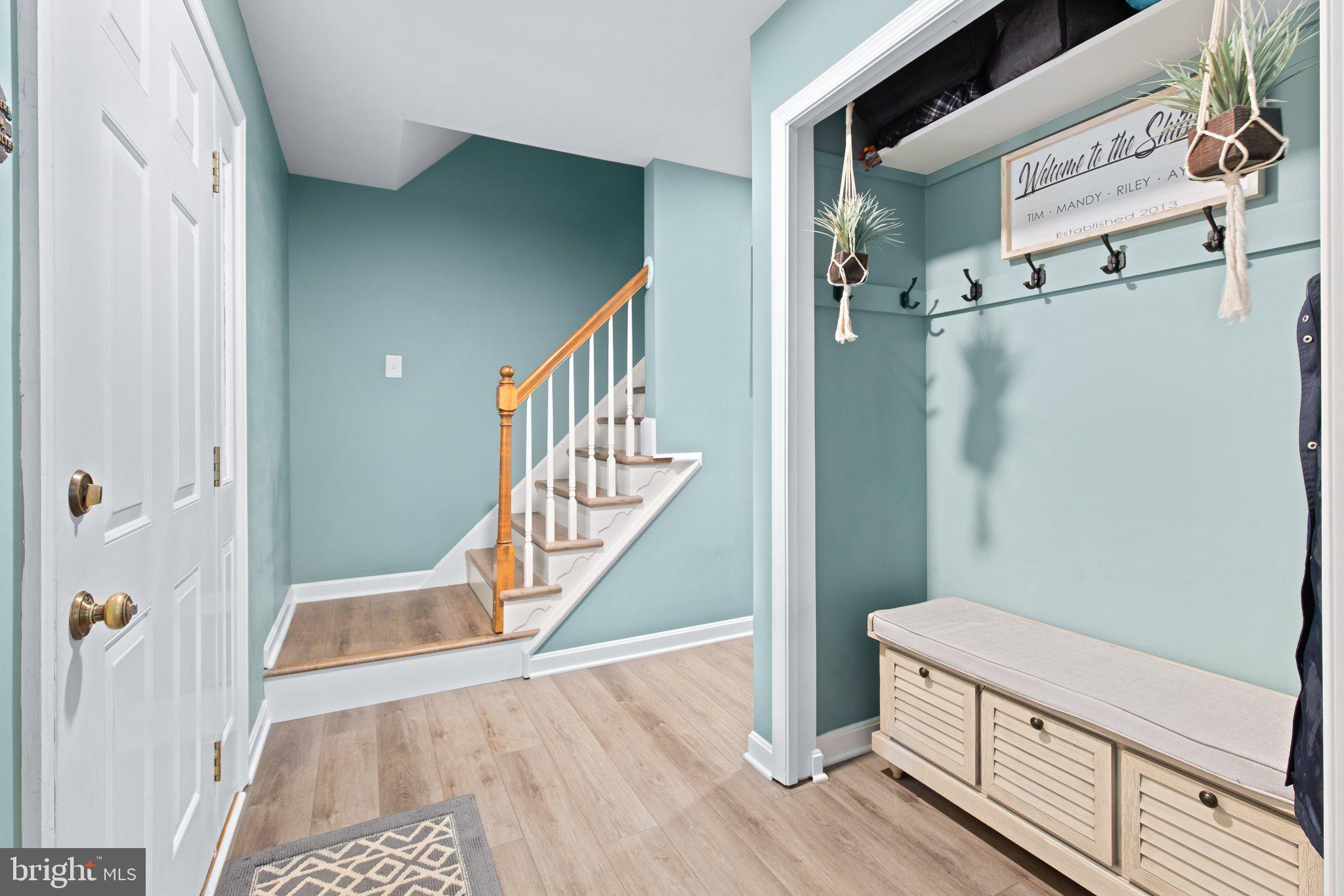 1024 Shadowstone Drive Lancaster, PA 17603 - Photo 4 of 28 a view of a hallway with wooden floor and staircase