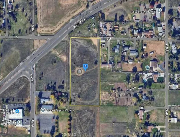 a view of a lake with a big yard