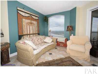 13599 Perdido Key Drive, Unit T12B Perdido Key, FL 32507 - Photo 2 of 12 a living room with furniture and a window