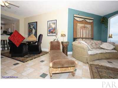 13599 Perdido Key Drive, Unit T12B Perdido Key, FL 32507 - Photo 4 of 12 a living room with furniture and a window