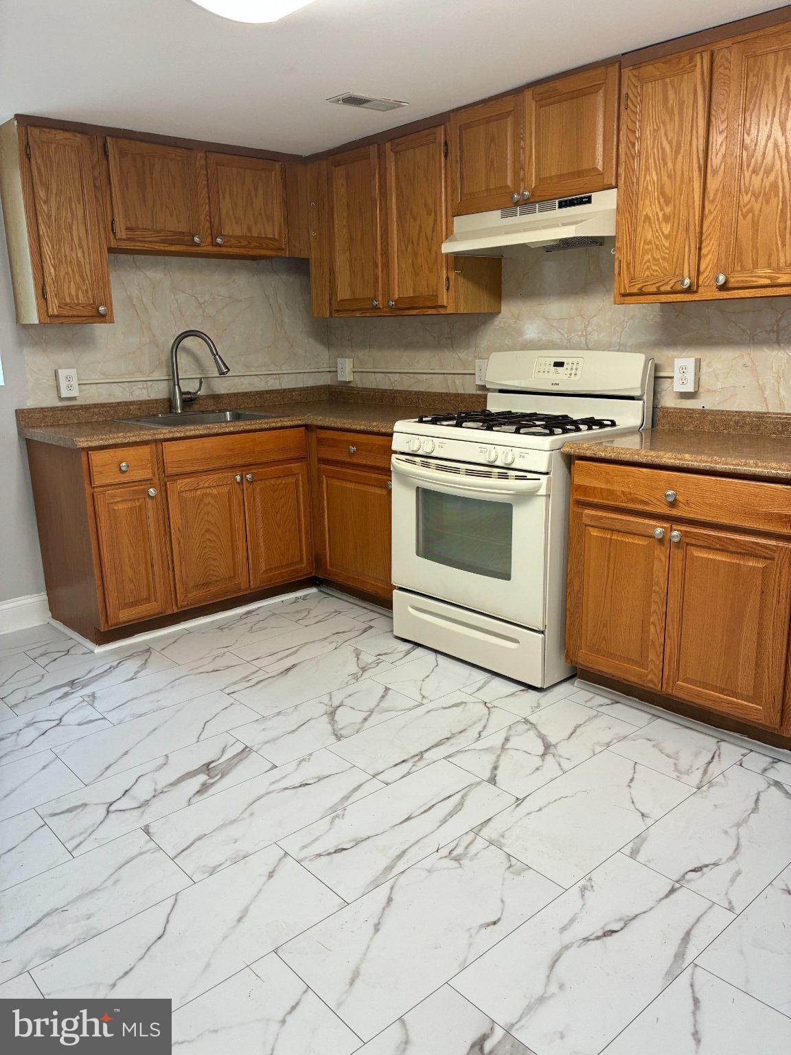 2228 Kennedy Avenue Lindenwold, NJ 08021 - Photo 3 of 8 Modern kitchen with elegant finishes.