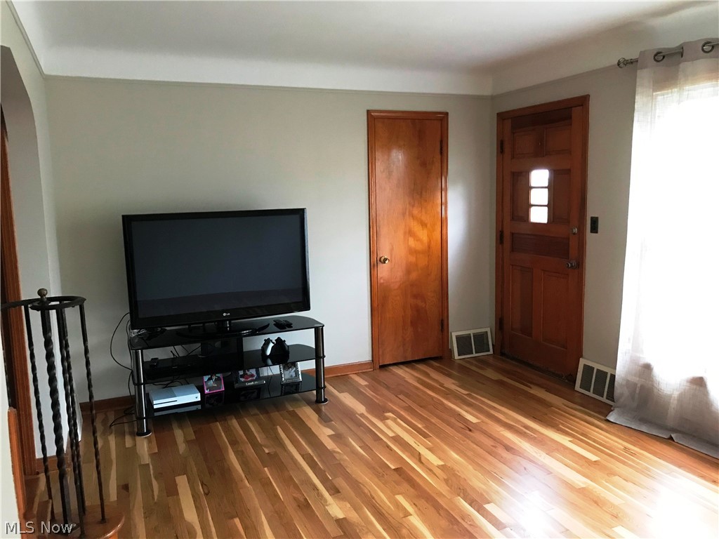 12014 Derby Road Garfield Heights, OH 44125 - Photo 3 of 20 Living Room refinished Hardwood
