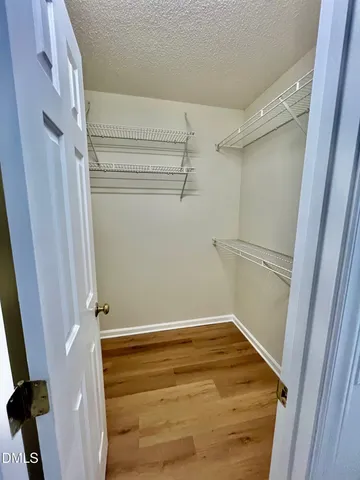 a view of a room with racks on the wall