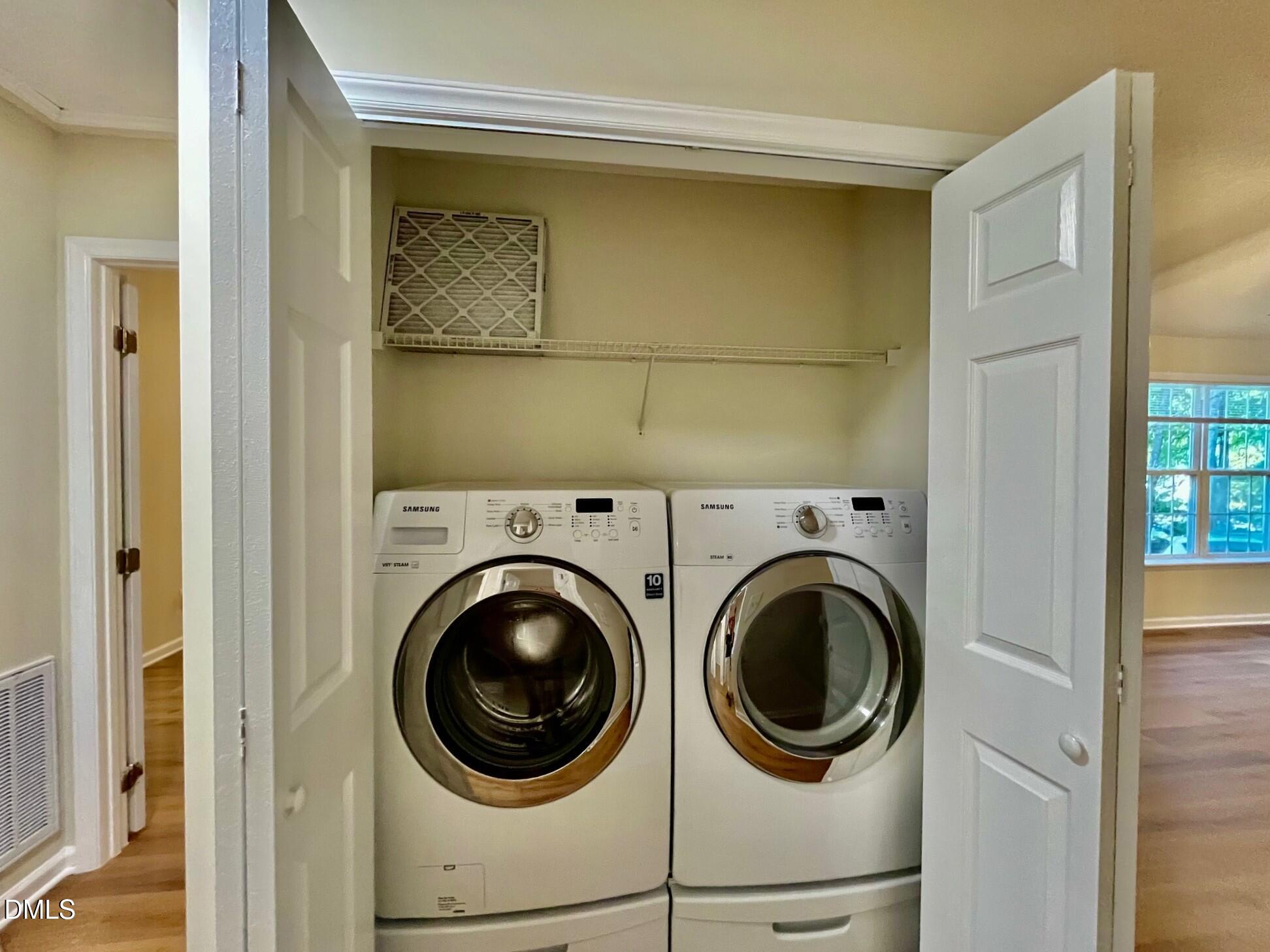 5413 Passenger Place Raleigh, NC 27603 - Photo 15 of 16 a utility room with dryer and washer