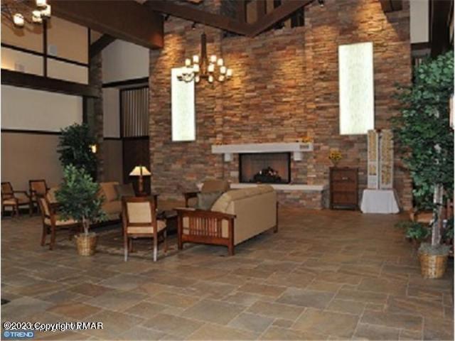 11 Cheilo Path Pocono Lake, PA 18347 - Photo 14 of 20 a view of a patio with couches table and chairs and potted plants