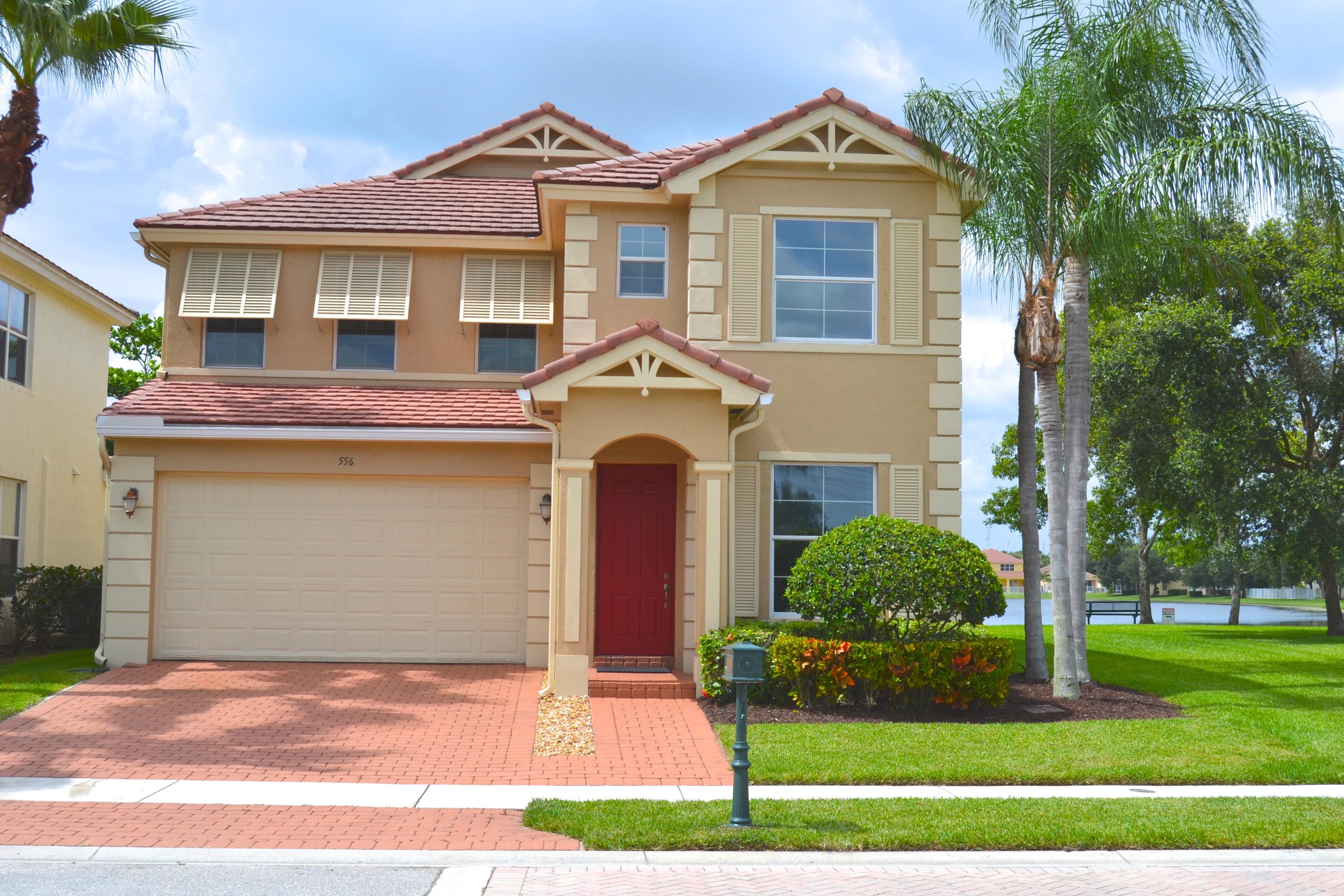 556 Mulberry Grove Road Royal Palm Beach, FL 33411 - Photo 1 of 30 Front View