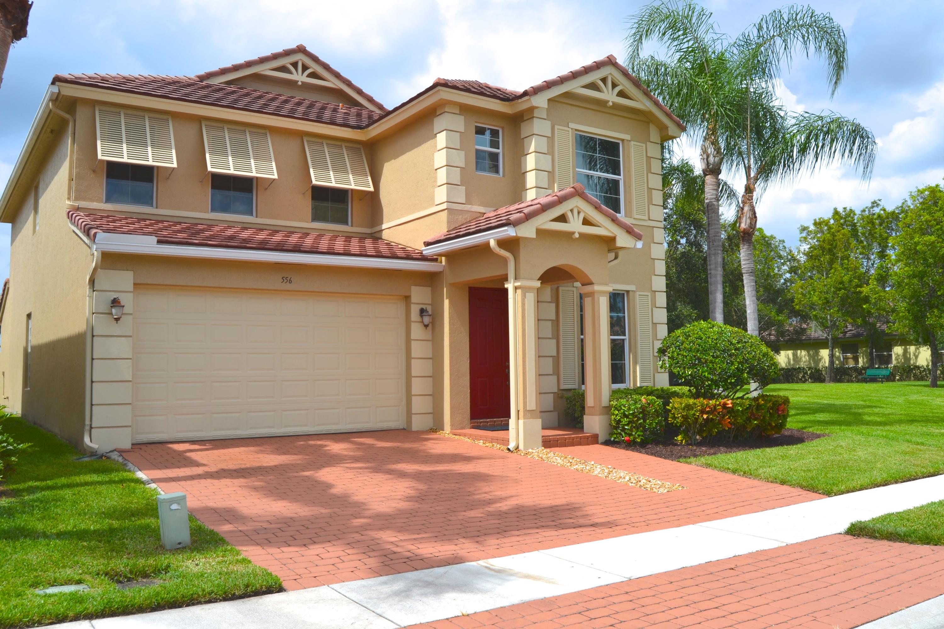 556 Mulberry Grove Road Royal Palm Beach, FL 33411 - Photo 3 of 30 Front View