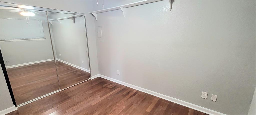 2500 Burleson Road, Unit 611 Austin, TX 78741 - Photo 9 of 22 a view of an empty walk in closet